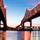 Toll bridge over Mississippi at sunset